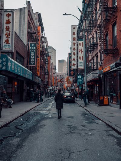 people standing on street near buildings during daytime